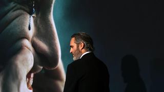 Real-life jokers spreading chaos with signs banning single men from <i>Joker</i> screenings